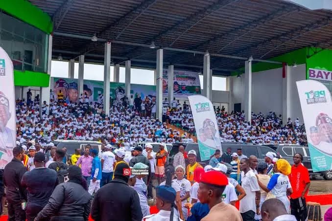 Supporters fill a stadium at a PBAT Door-to-Door rally